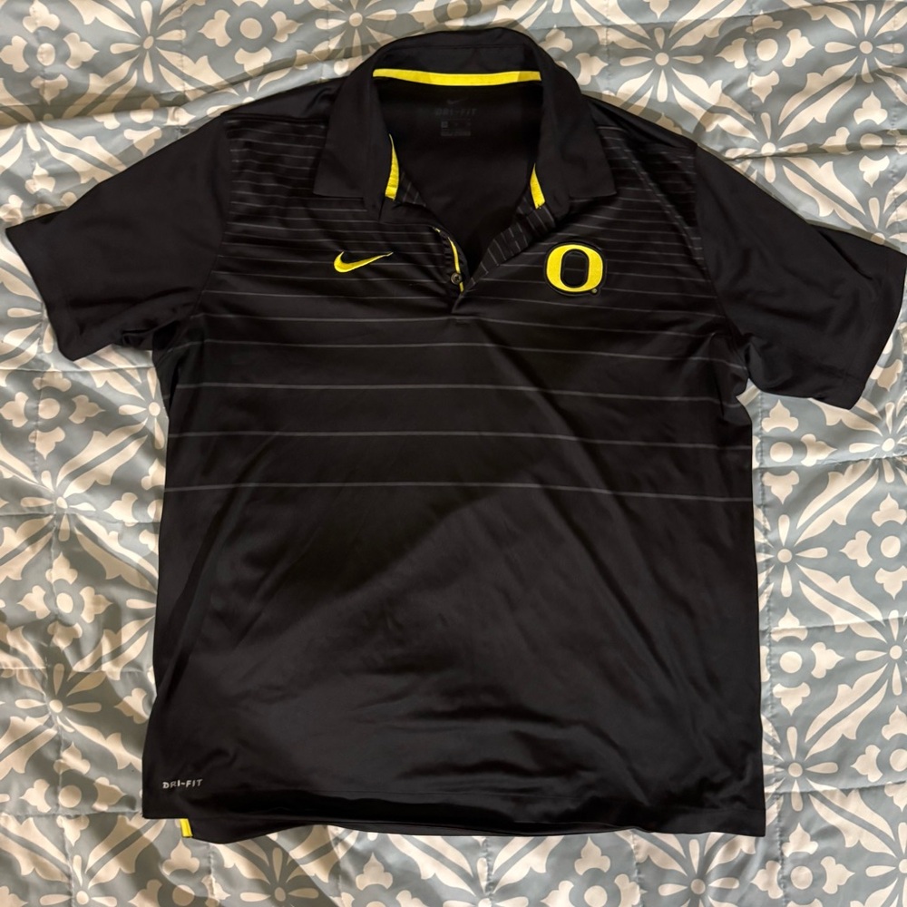 Nike Men's Black Polo Shirt with Yellow Details